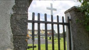 Tuam gate with a christian cross